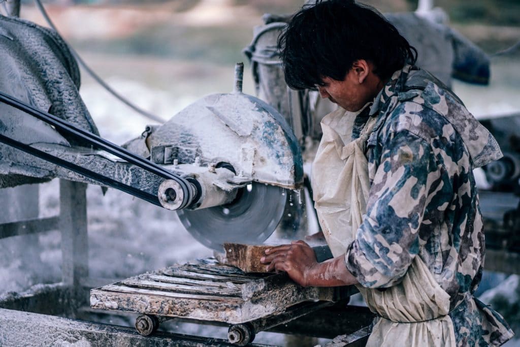 A worker being exposed to silica